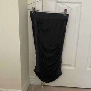 Ruched front draped skirt with side buttons